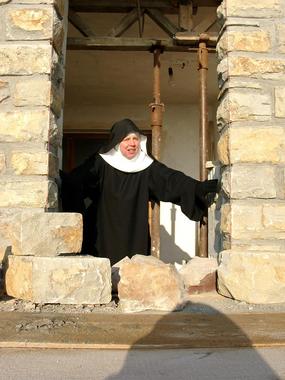 OSB nun posing as St Scholastica.jpg